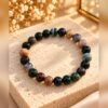 bracelet-sylva-agate-indienne-2 Bracelet SYLVA en agate indienne 8 mm sur un socle en pierre claire avec gypsophile