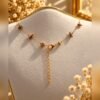 Collier DUNE vu de dos avec mousqueton et chaînette de rallonge – Serinaé